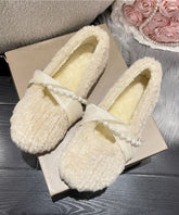 Zapatos planos de piel afelpada de color albaricoque francés para mujer